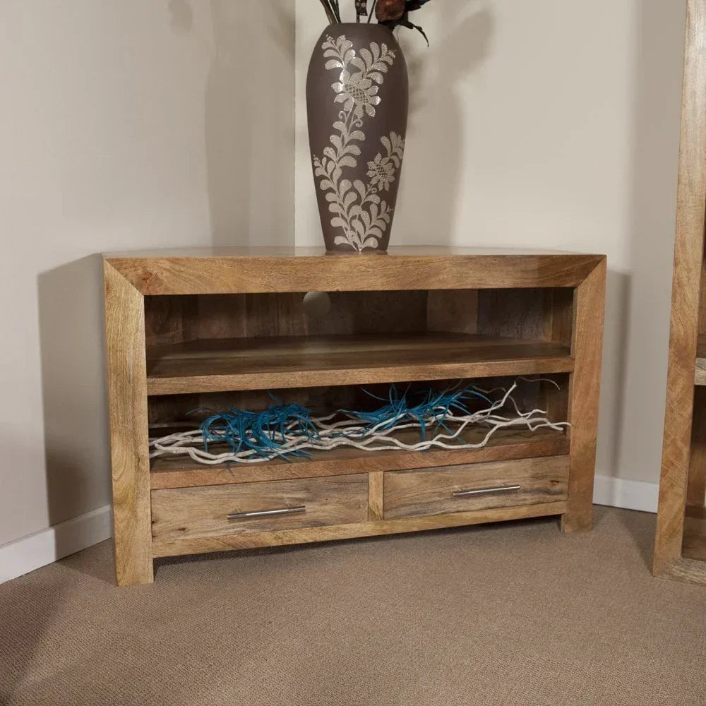 Solid wood TV unit with open shelves and two drawers in a living room corner