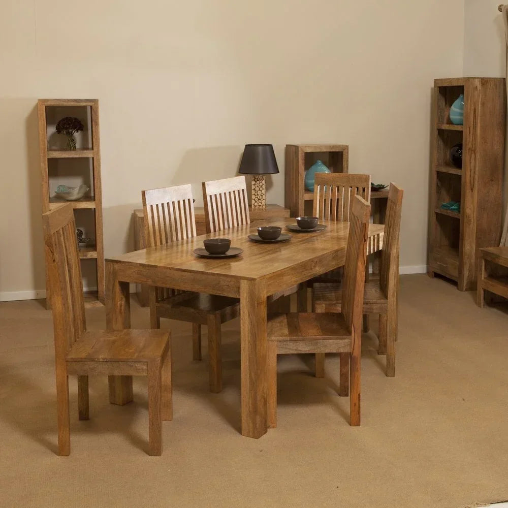 Solid wood dining table set with six chairs, matching shelving units, and neutral decor