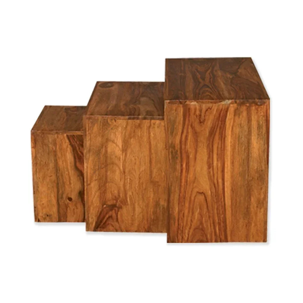 Set of three solid wood nesting tables with natural grain finish, side angle view
