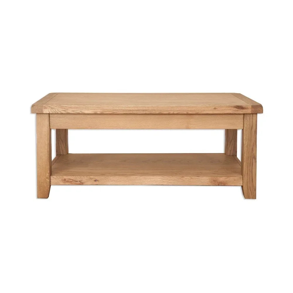Oak coffee table with lower shelf and rectangular top, displayed on white background