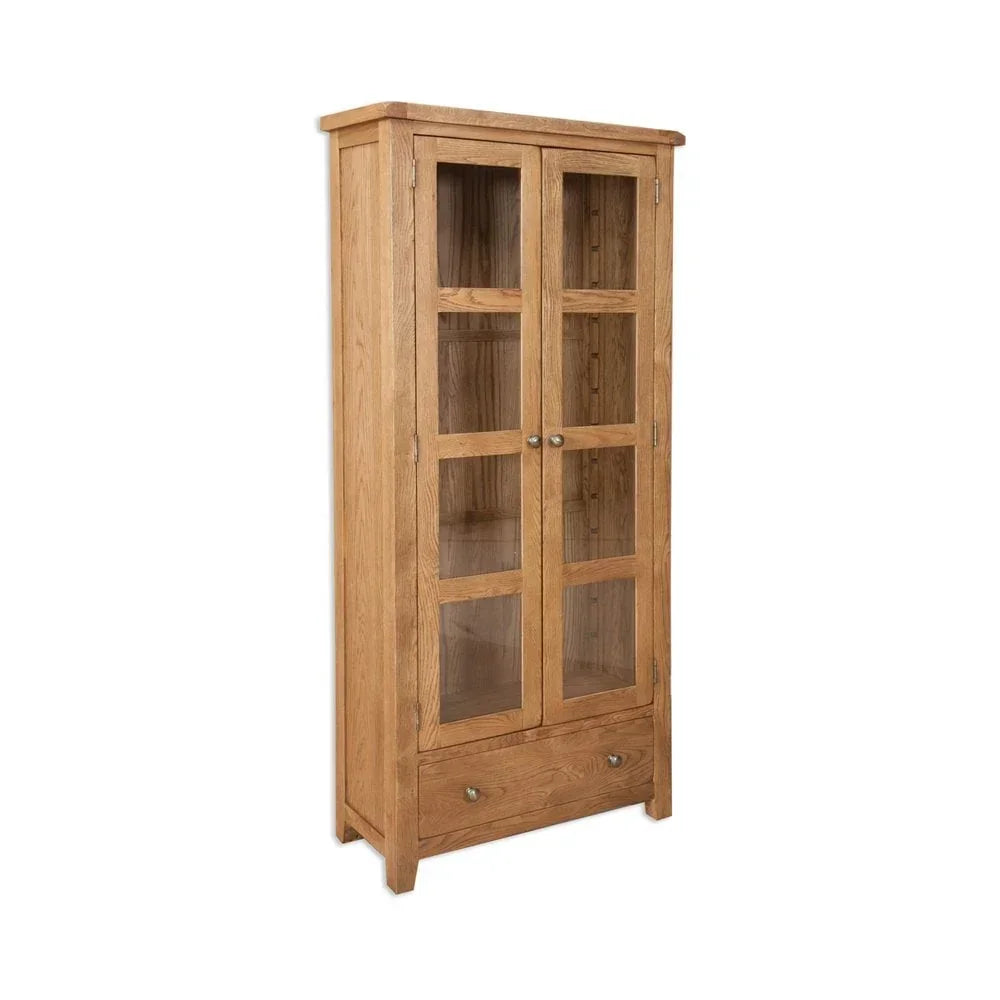 Oak display cabinet with glass double doors and lower storage drawer