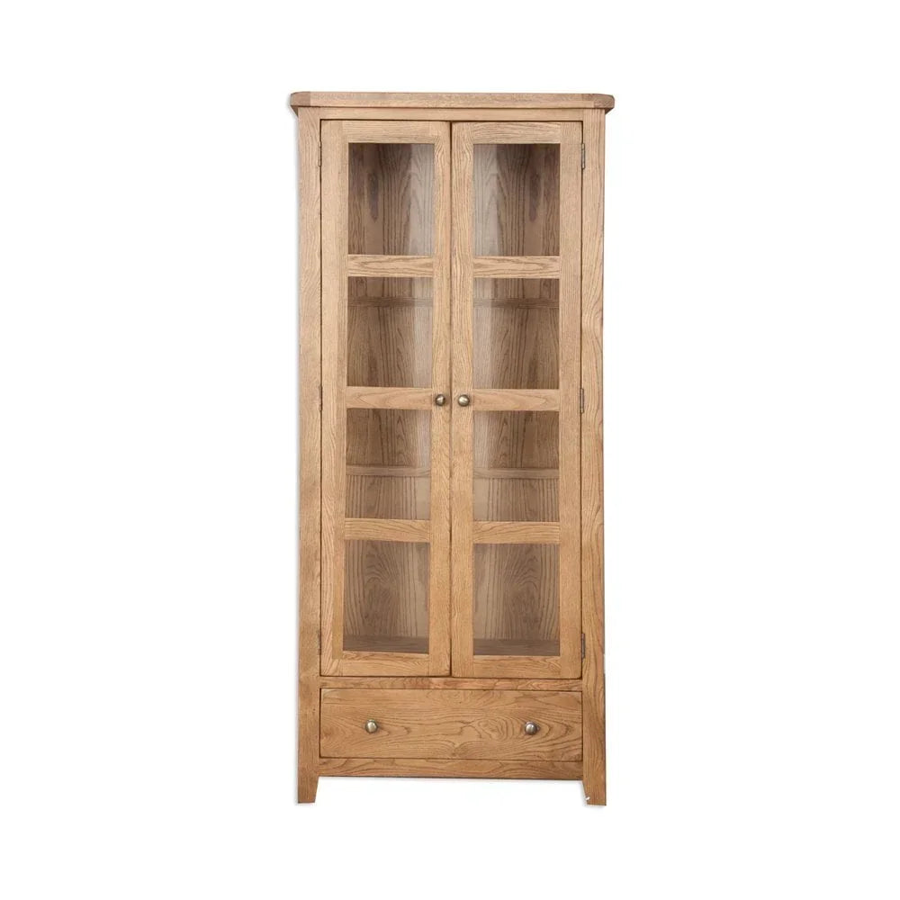 Oak display cabinet with glass doors and lower drawer, front view