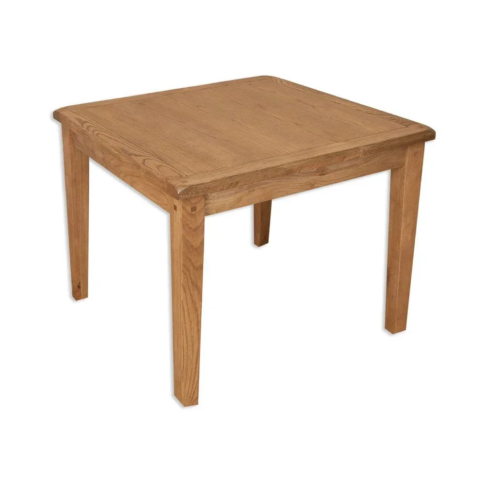 Square oak dining table with sturdy legs and natural wood grain finish