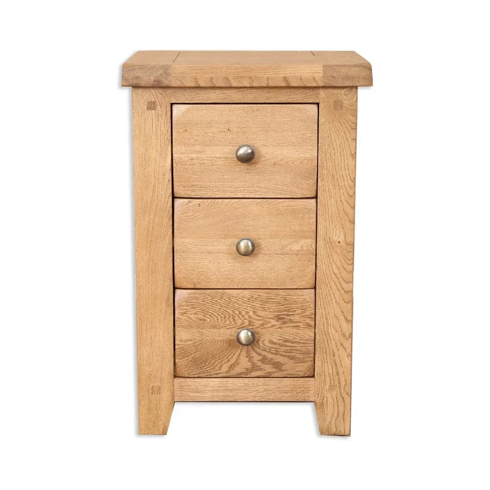 Oak bedside cabinet with three drawers and metal handles, front view
