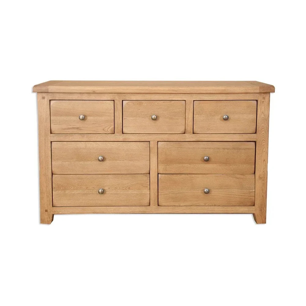 Oak chest of drawers with six spacious drawers and metal handles, front view