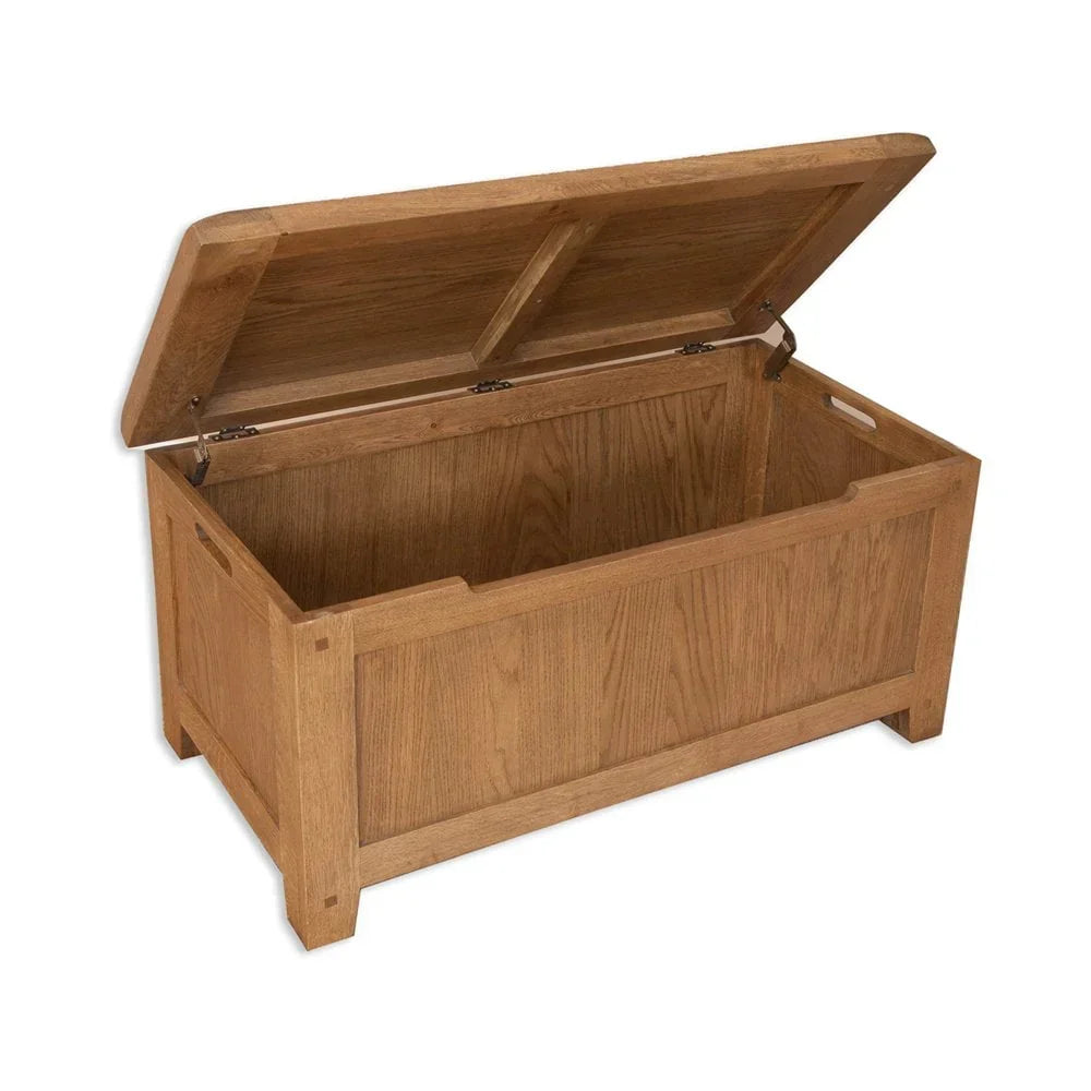 Oak storage chest with open lid and visible wood grain finish