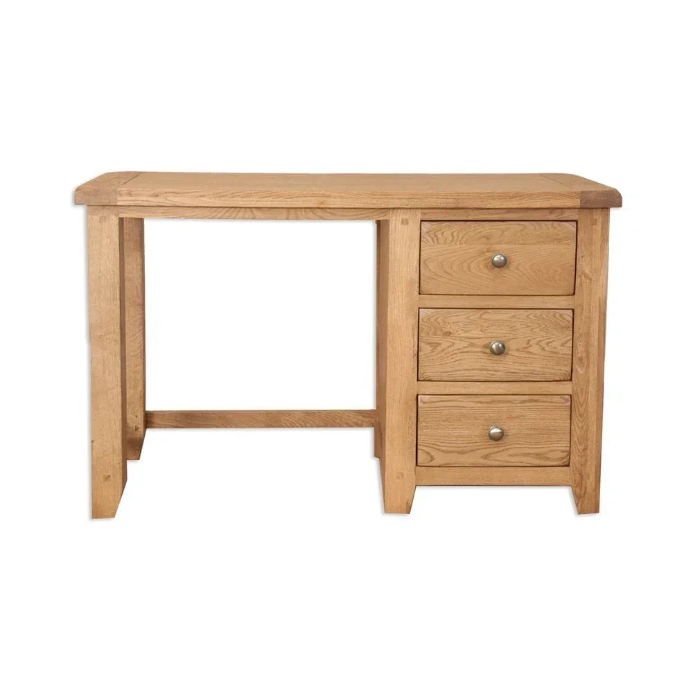 Oak desk with three drawers and metal knobs, natural wood grain, front view