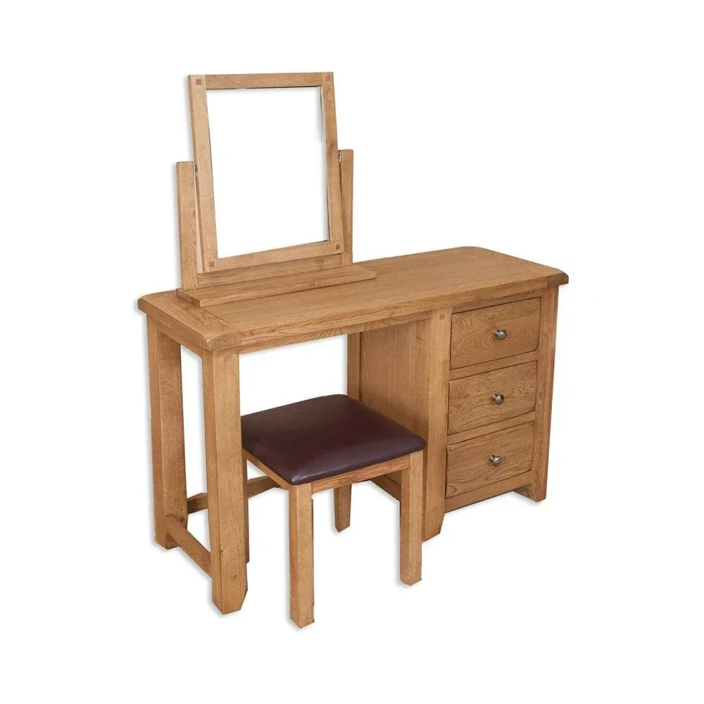 Oak dressing table with three drawers, square mirror, and matching stool with brown seat