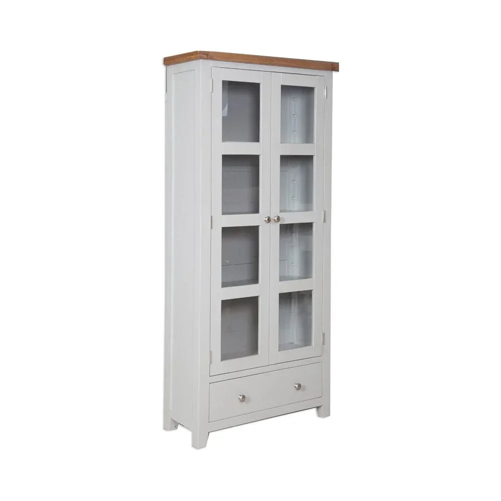 White display cabinet with glass doors, wooden top, and lower storage drawer