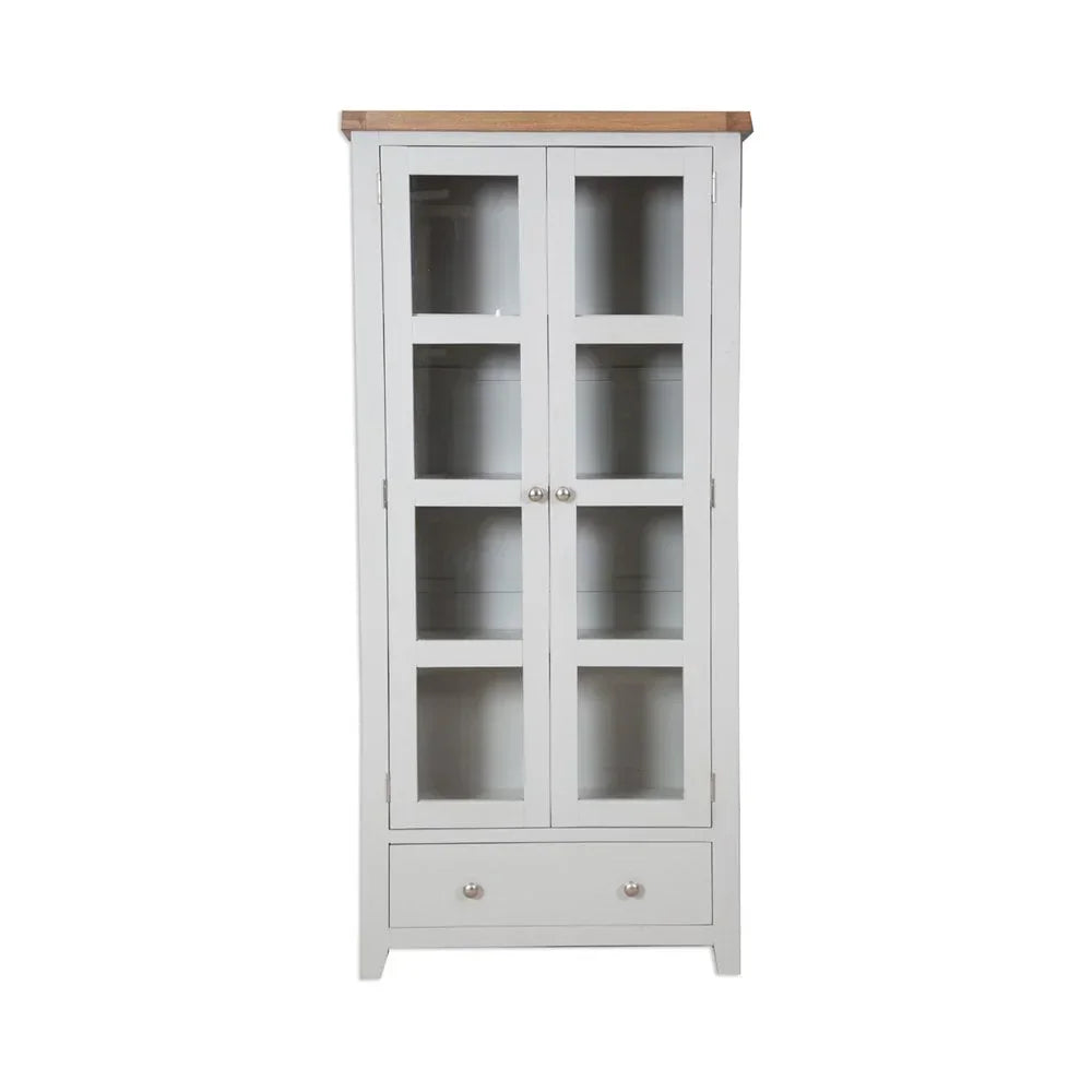 White display cabinet with glass doors, wooden top, and single lower storage drawer
