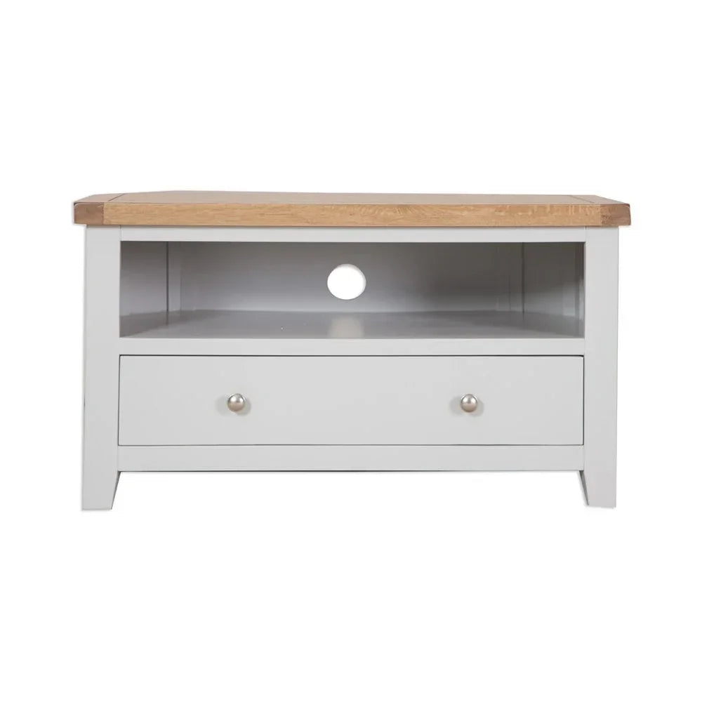 White TV unit with oak top, open shelf, cable hole, and single drawer with metal knobs