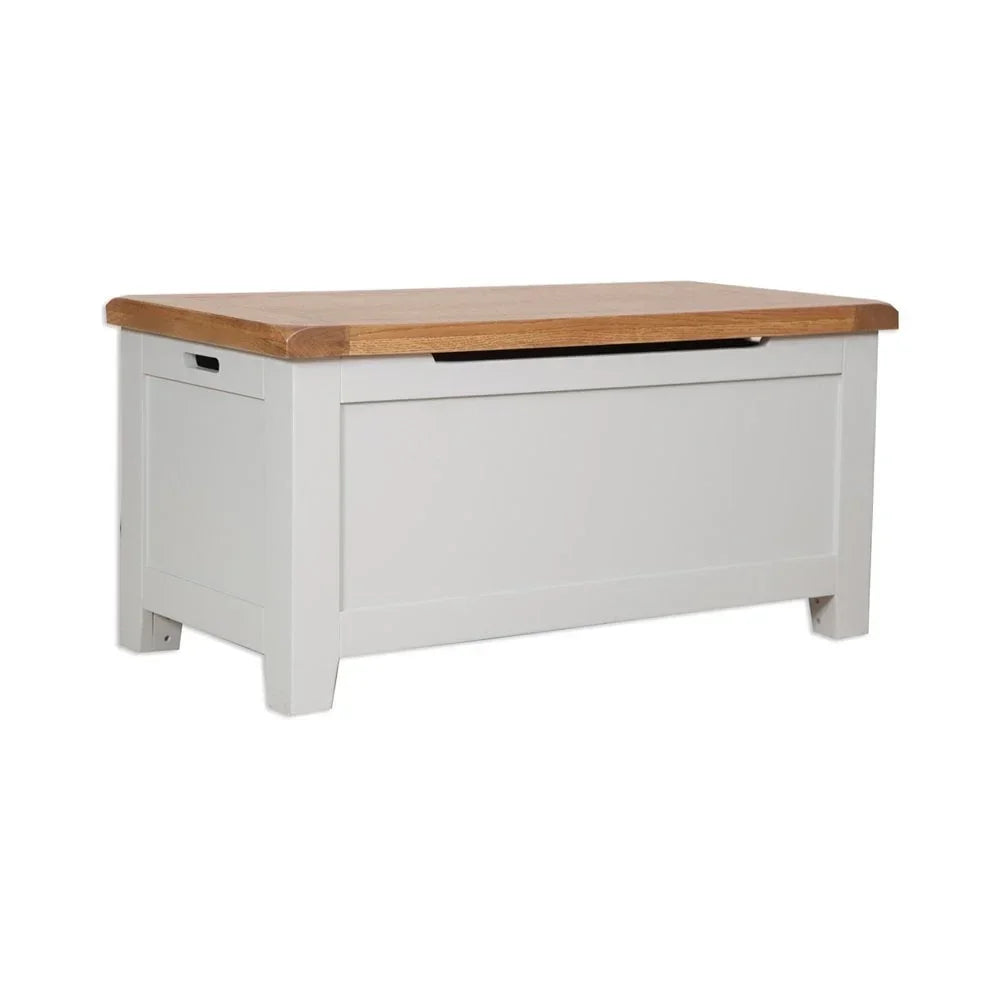 Wooden storage bench with white painted base and oak top, front angle view