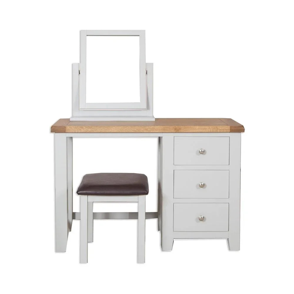 White and oak dressing table with mirror, three drawers, and cushioned stool
