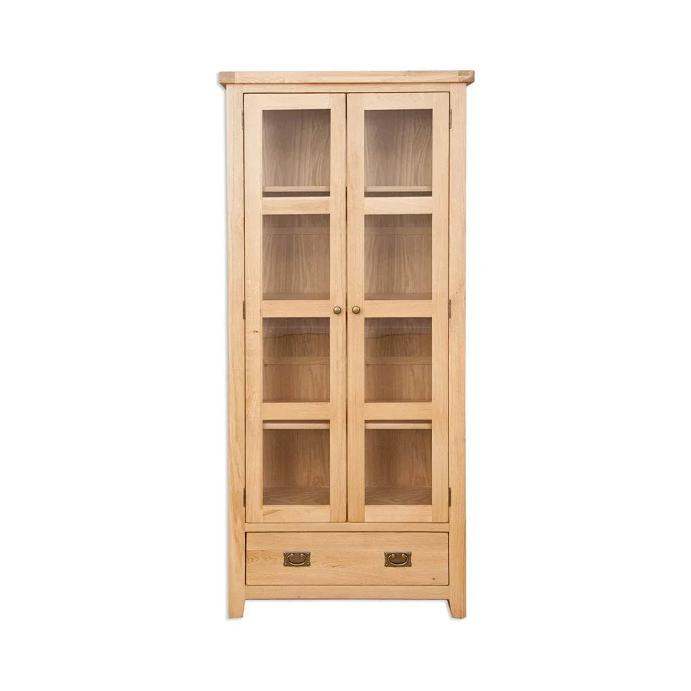 Oak display cabinet with glass doors, shelves, and brass handle drawer at base