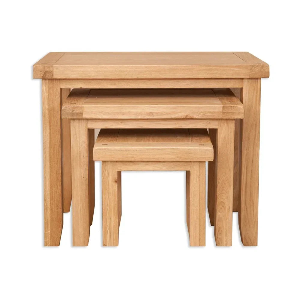 Oak nest of tables set with three stacked rectangular tables, natural wood finish