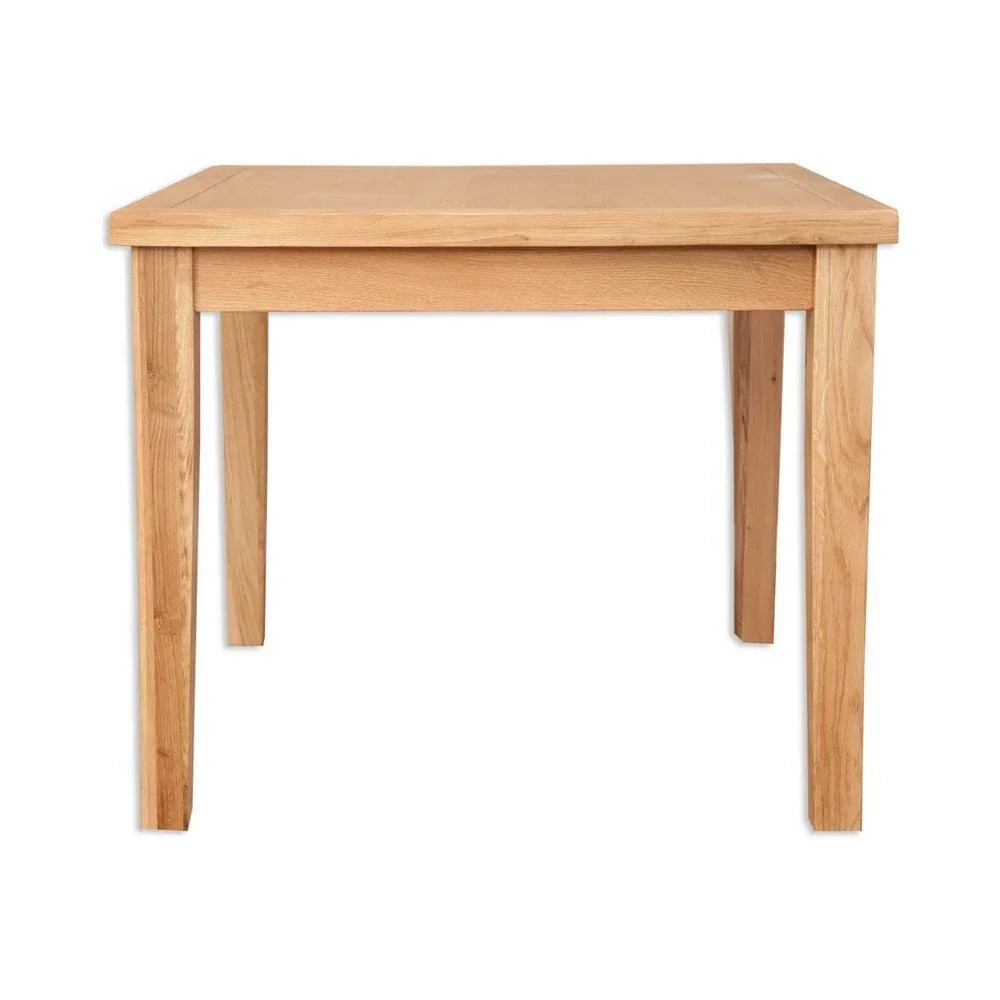 Square oak dining table with straight legs and natural wood finish, front view