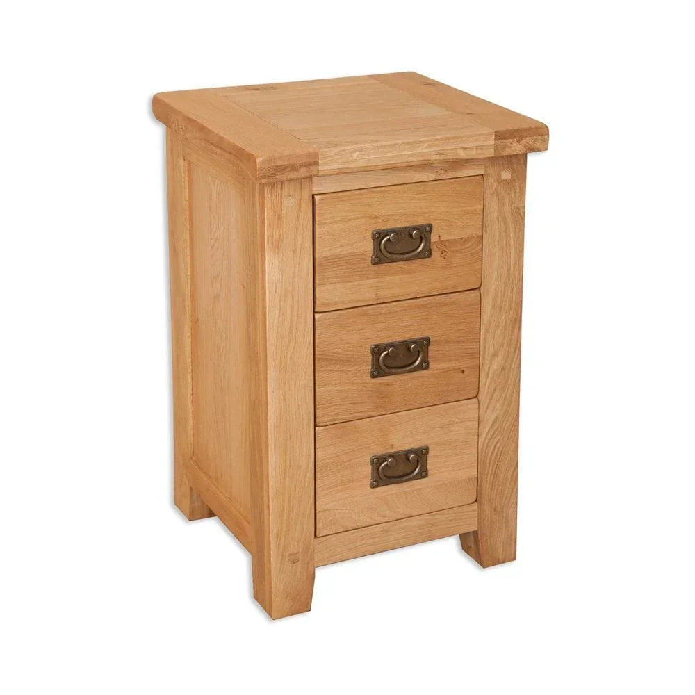 Oak bedside cabinet with three drawers and metal handles, angled front view