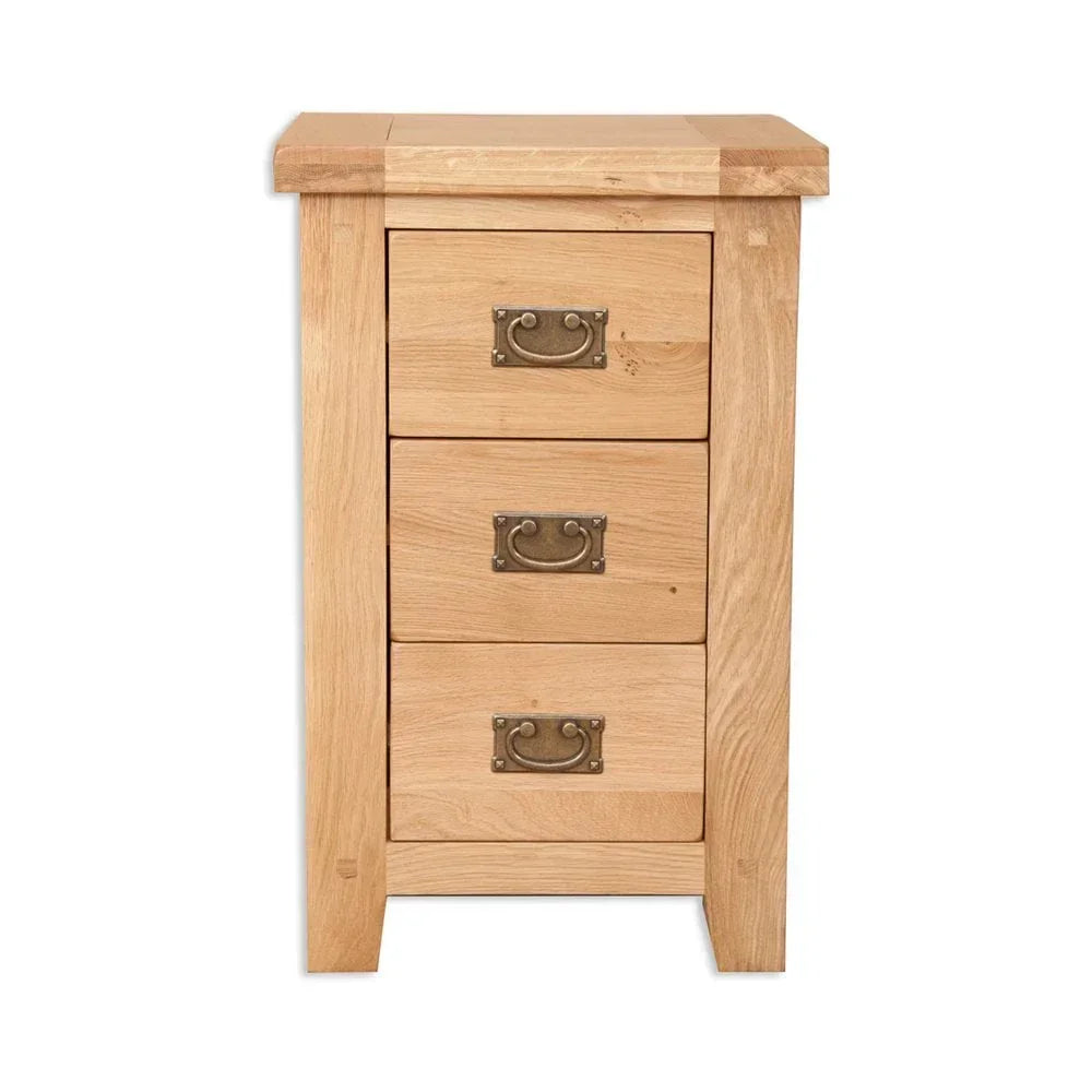 Oak bedside table with three drawers and antique brass handles