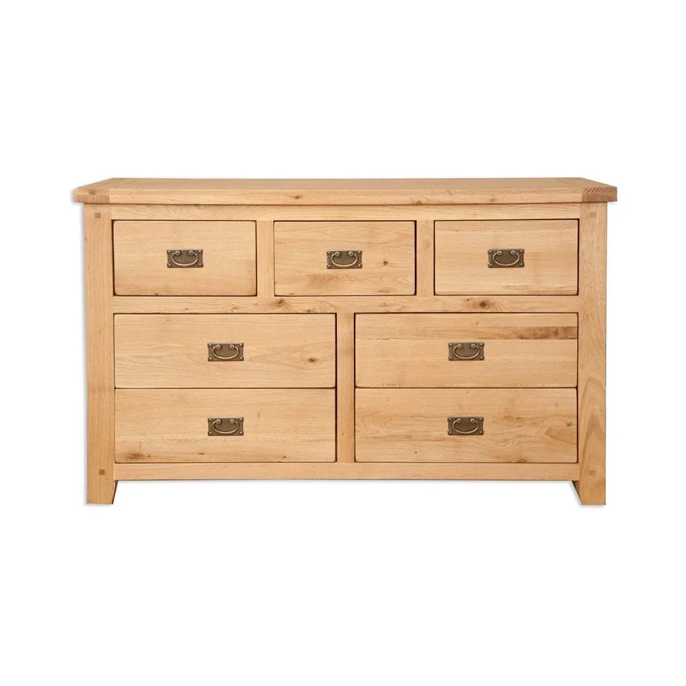 Oak chest of drawers with brass handles and six spacious storage drawers, front view