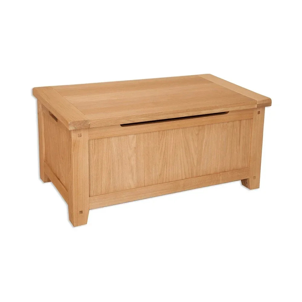 Oak wooden blanket box with lift-up lid and panelled design