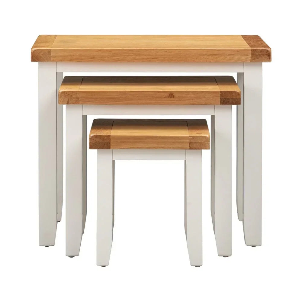 Oak and white painted nesting tables set with rectangular tops and sturdy legs