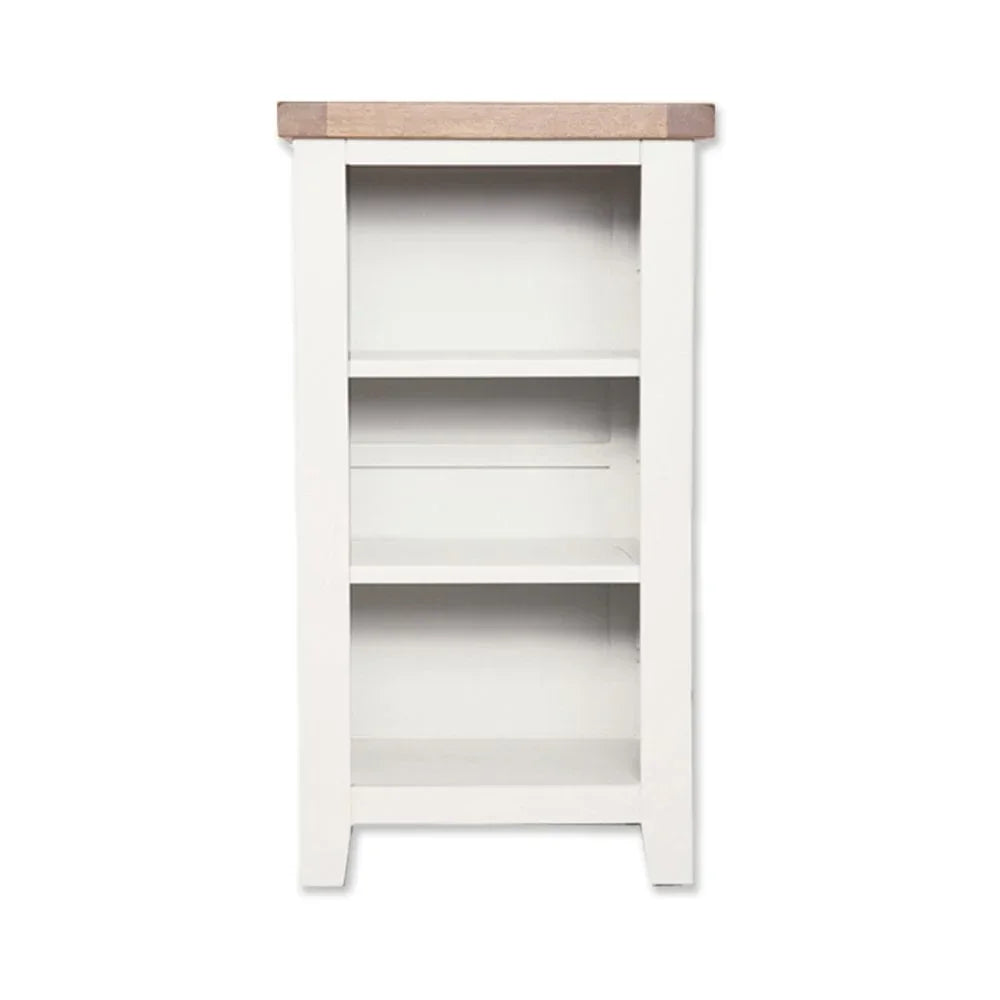 White wooden bookcase with three open shelves and light oak top, front view