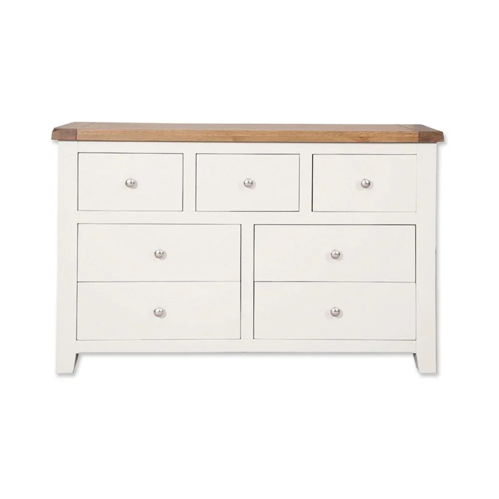 White wooden chest of drawers with oak top and six drawers, front view
