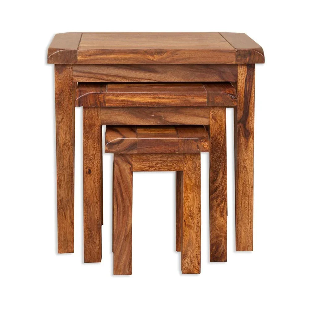 Solid wood nest of three tables with natural grain finish, stacked front view