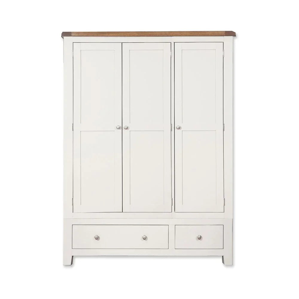 White wooden wardrobe with three doors, two drawers, and contrasting oak top