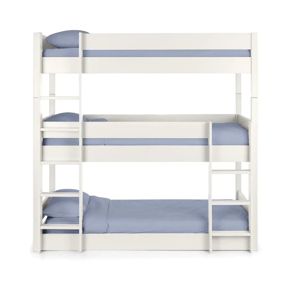 White triple bunk bed with ladders, blue bedding, and safety rails on middle and top bunks