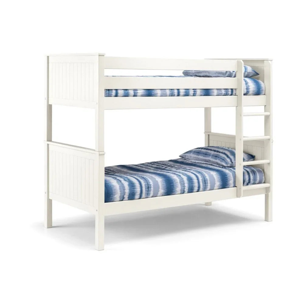 White wooden bunk bed with striped blue bedding and built-in ladder, side view