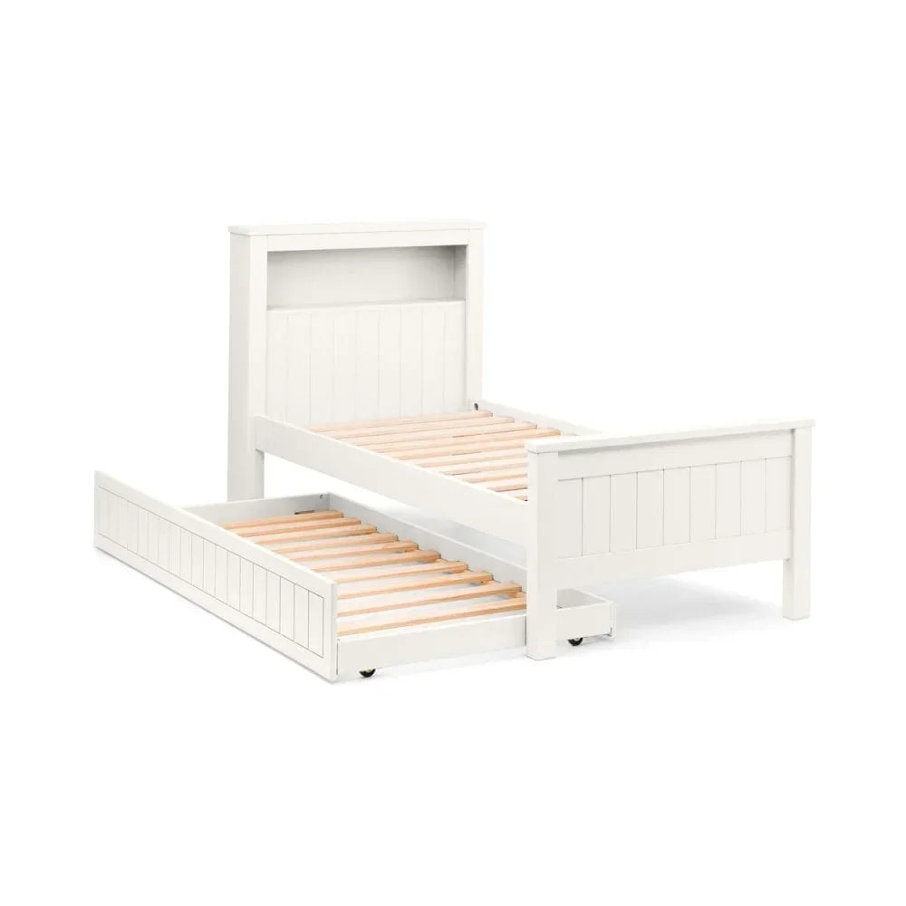 White wooden bed frame with pull-out trundle and slatted base, front angled view