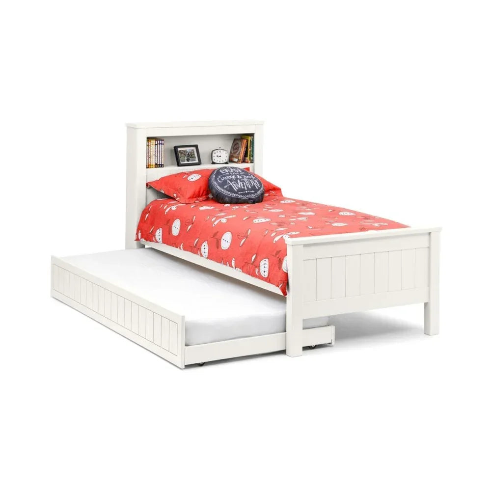 White wooden single bed with built-in bookshelf headboard and pull-out guest trundle bed