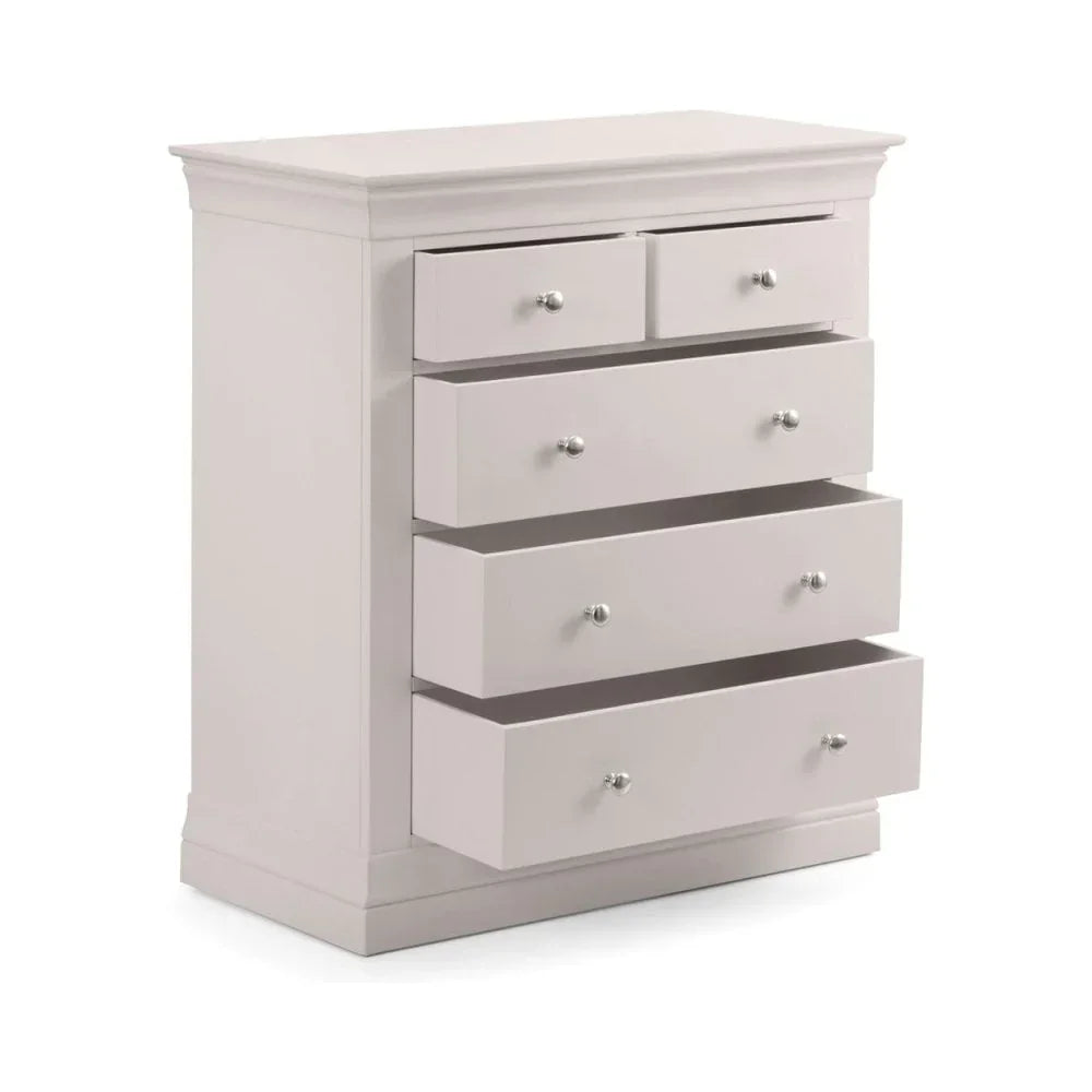 White chest of drawers with five drawers partially open, modern bedroom furniture