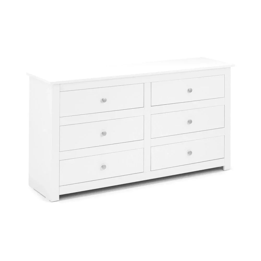 White six drawer chest of drawers with silver handles, angled side view
