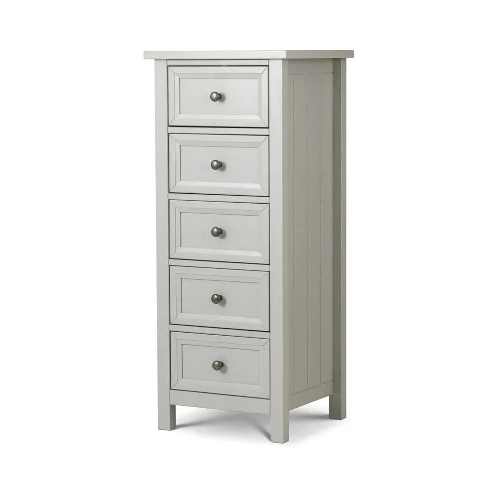 Tall grey bedroom chest of drawers with five drawers and metal handles, side angle view