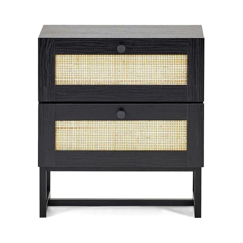 Black wood bedside table with rattan drawers and metal legs, front facing view