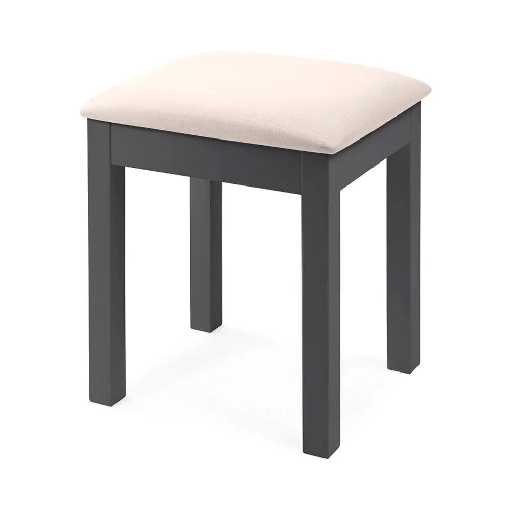 Black wooden stool with beige cushioned seat and square legs