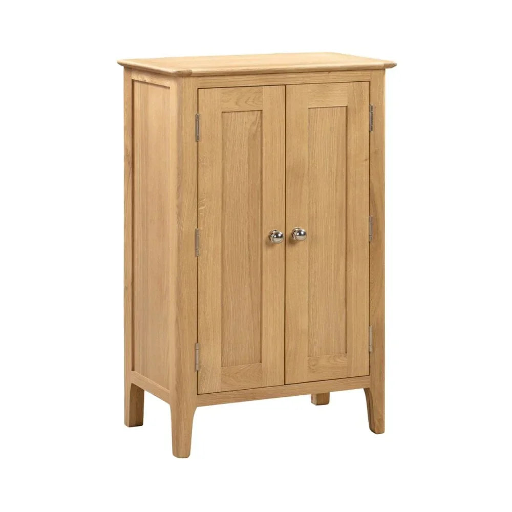 Oak wooden storage cabinet with double doors and metal handles, front side view