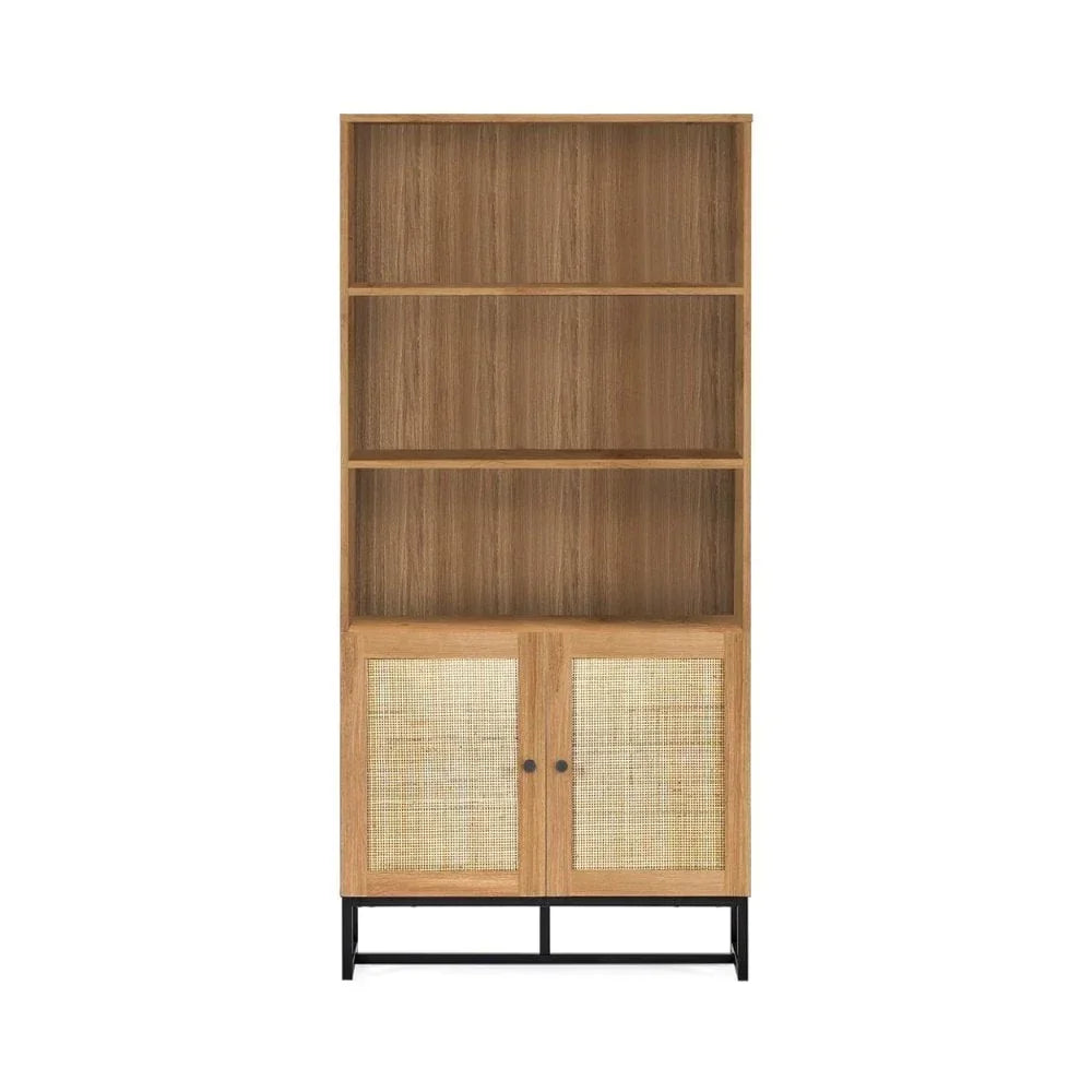 Tall wooden bookcase with three open shelves and two cane panel doors on black metal legs