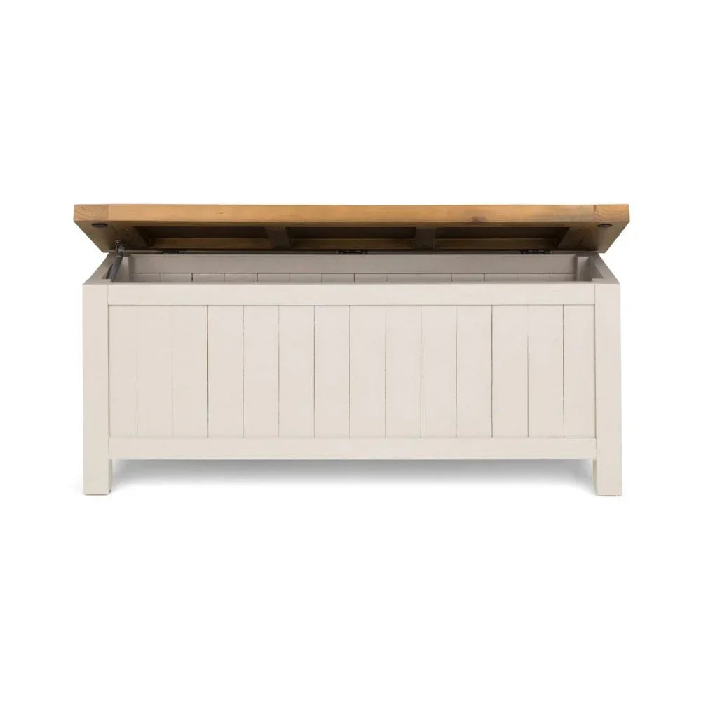 Wooden storage bench with slatted cream base and open oak lid, front view