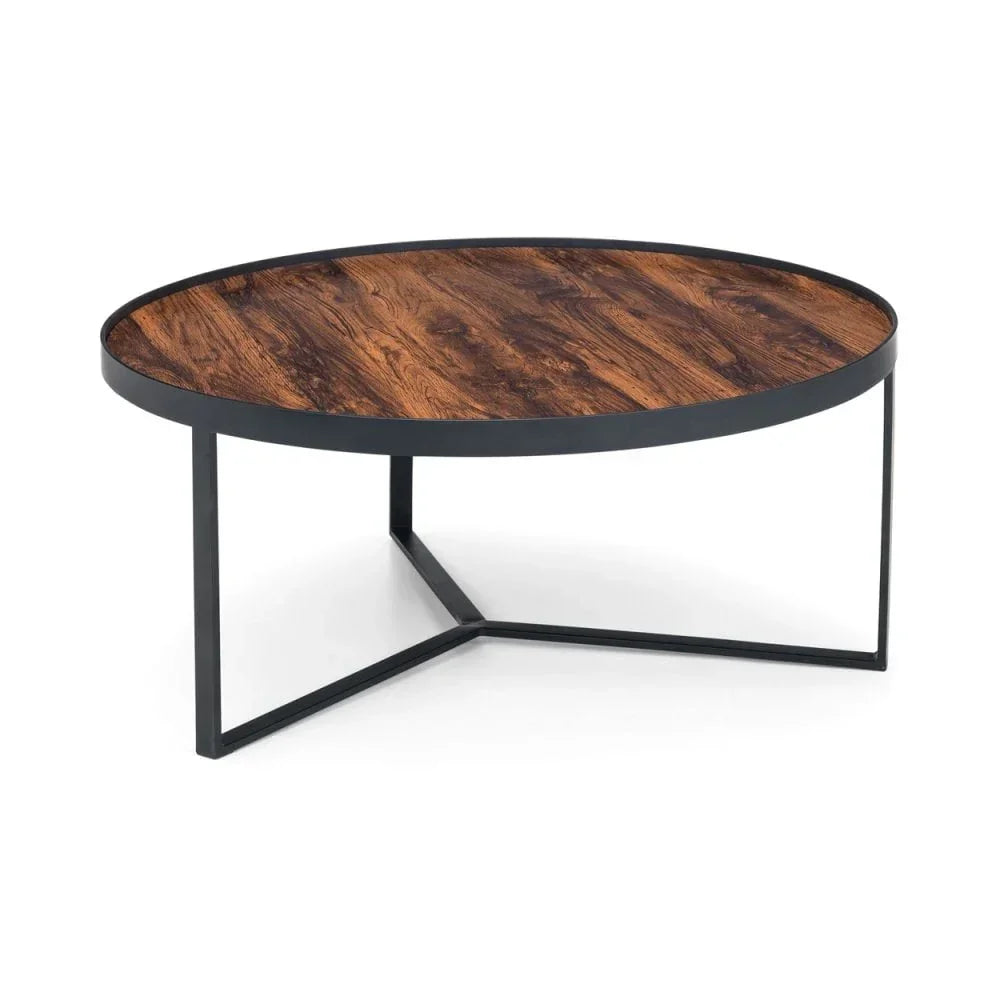Round wooden coffee table with black metal frame and crossed leg design