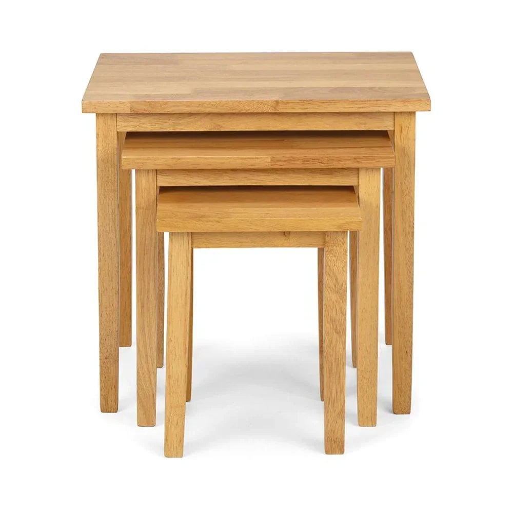 Oak nest of three wooden tables with square tops and straight legs, stacked front view