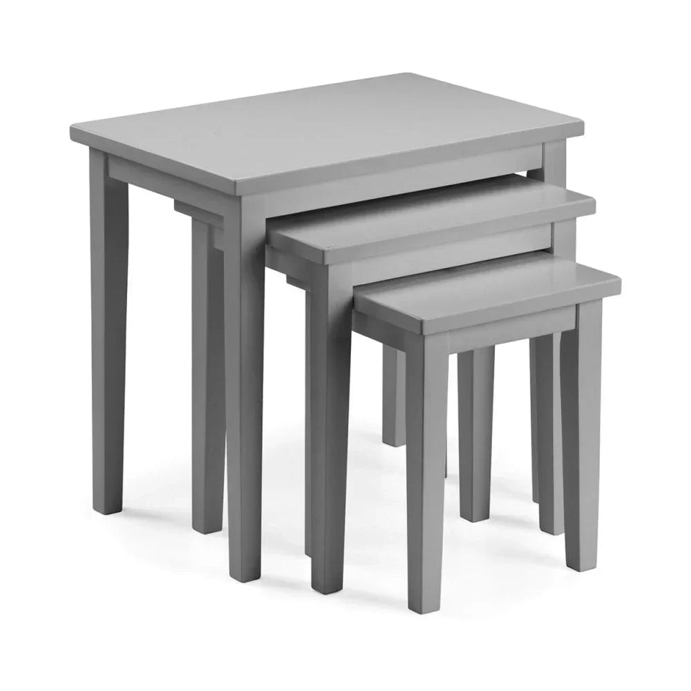 Grey wooden nesting tables set with three stackable tables, shown from side angle