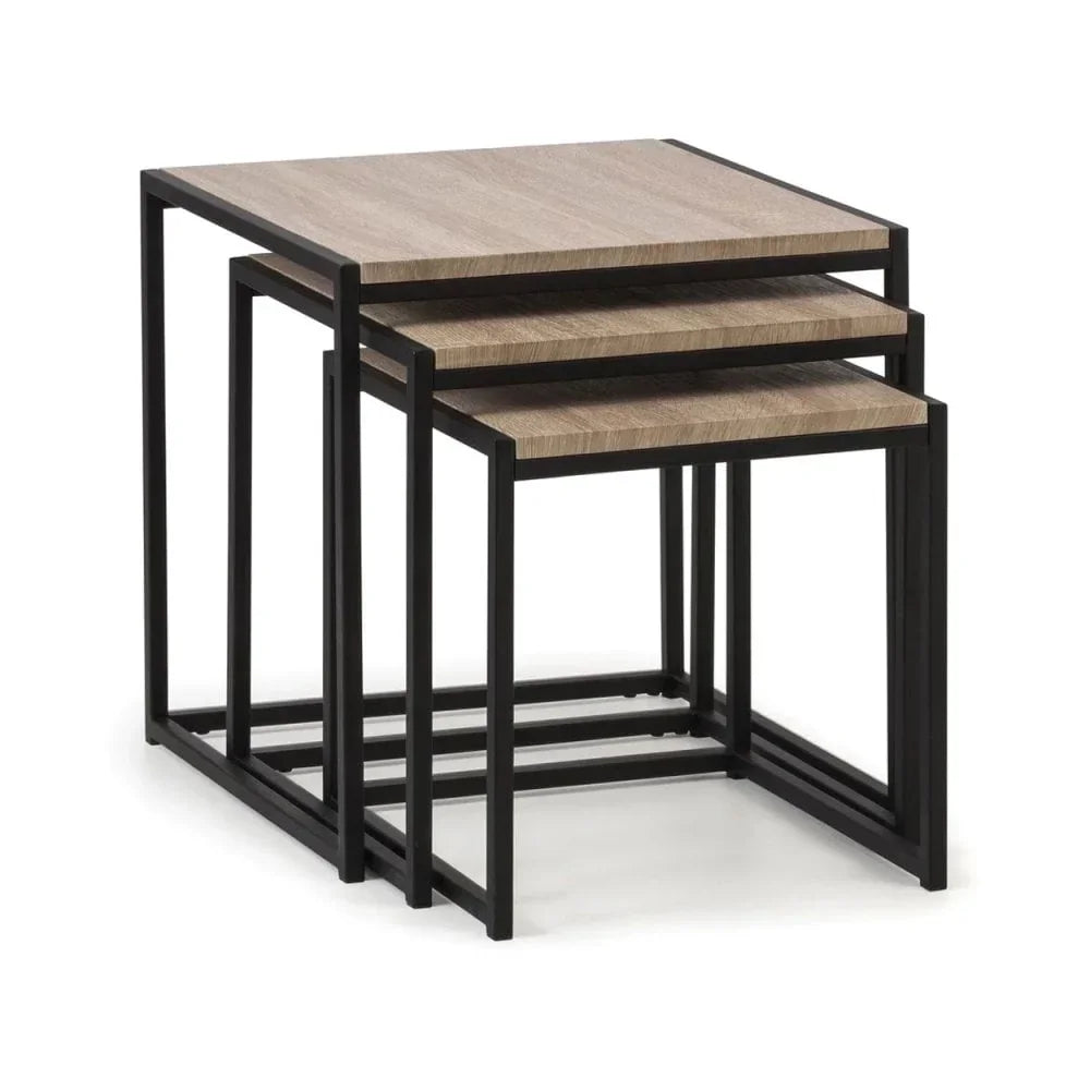 Industrial nest of tables with black metal frame and oak finish tops, side angle view