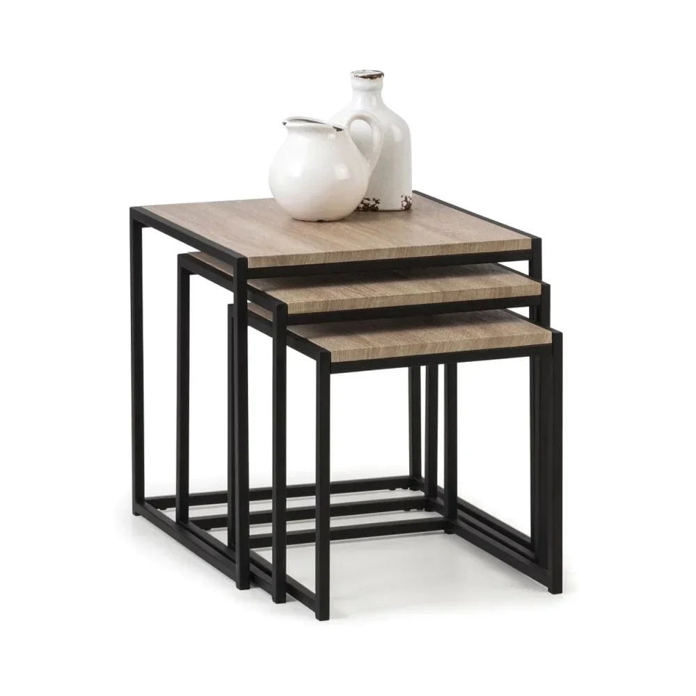 Set of three nesting tables with wood tops and black metal frames, side view