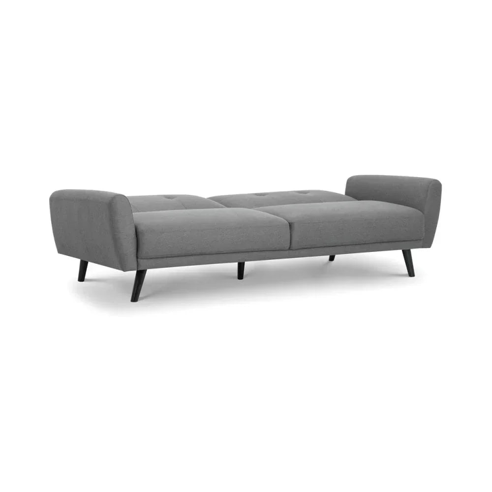 Grey fabric sofa bed with tufted seat and angled black legs, viewed from the front side