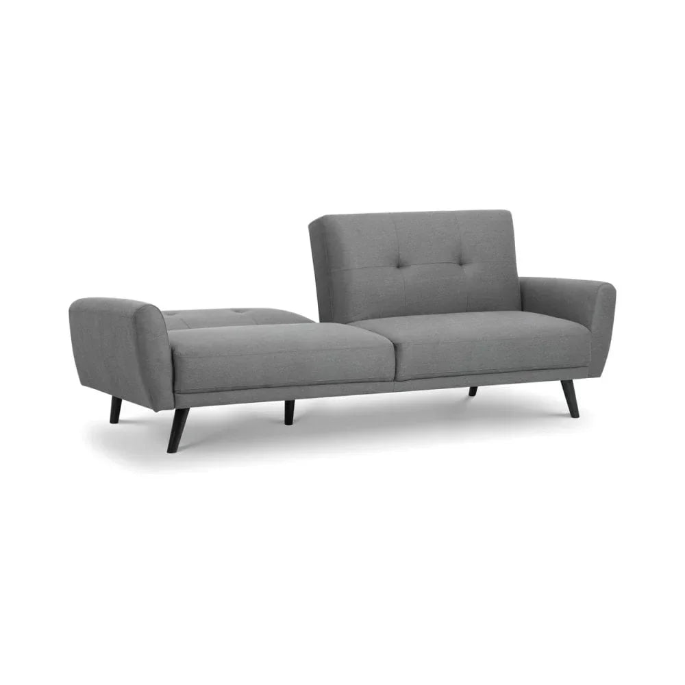 Grey fabric corner sofa with chaise and black tapered legs on white background