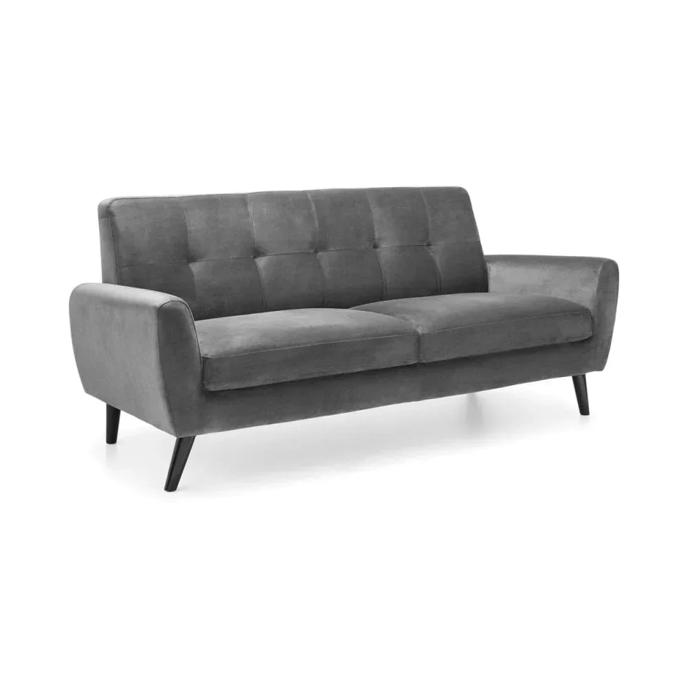 Grey fabric sofa with tufted backrest and angled wooden legs on white background