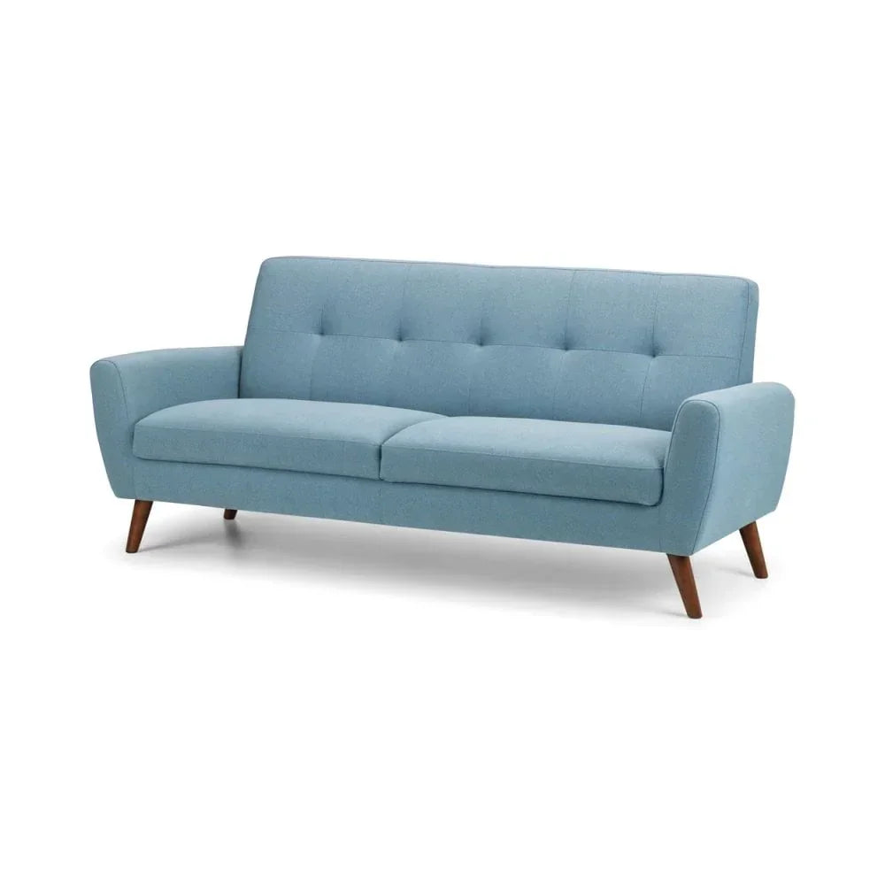 Light blue fabric sofa with button-tufted back and angled wooden legs on white background